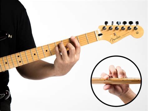 How to Hold an Electric Guitar: A Symphony of Posture and Rebellion